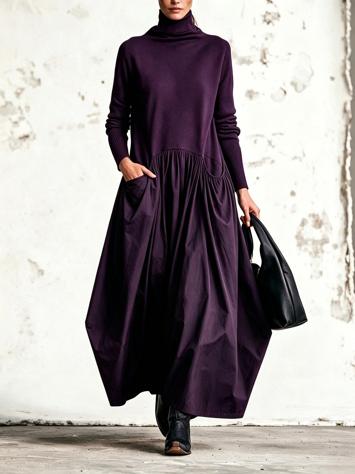 Celinne- Abito lungo oversize nero con collo alto e tasche decorative