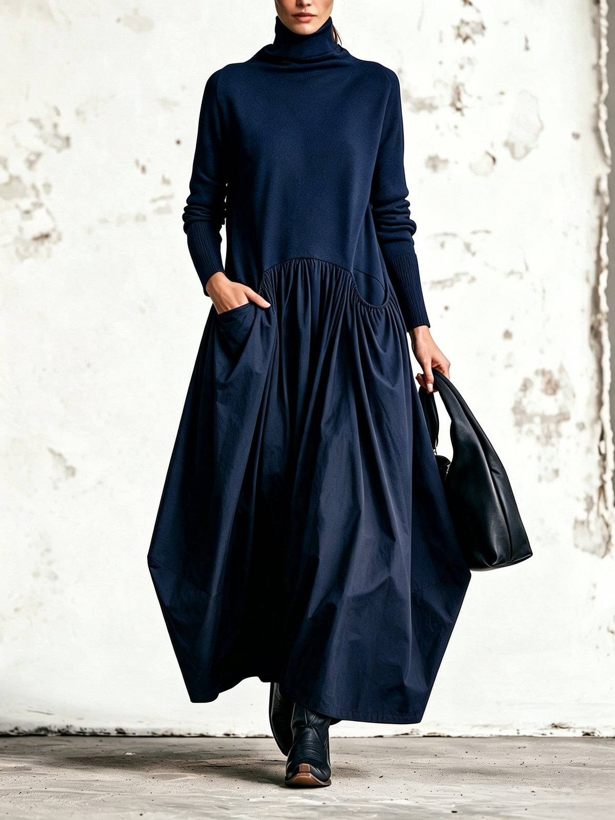 Celinne- Abito lungo oversize nero con collo alto e tasche decorative