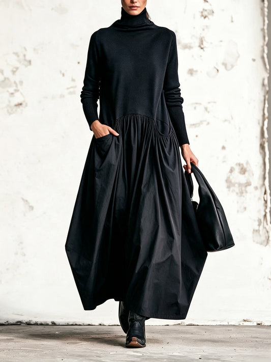 Celinne- Abito lungo oversize nero con collo alto e tasche decorative