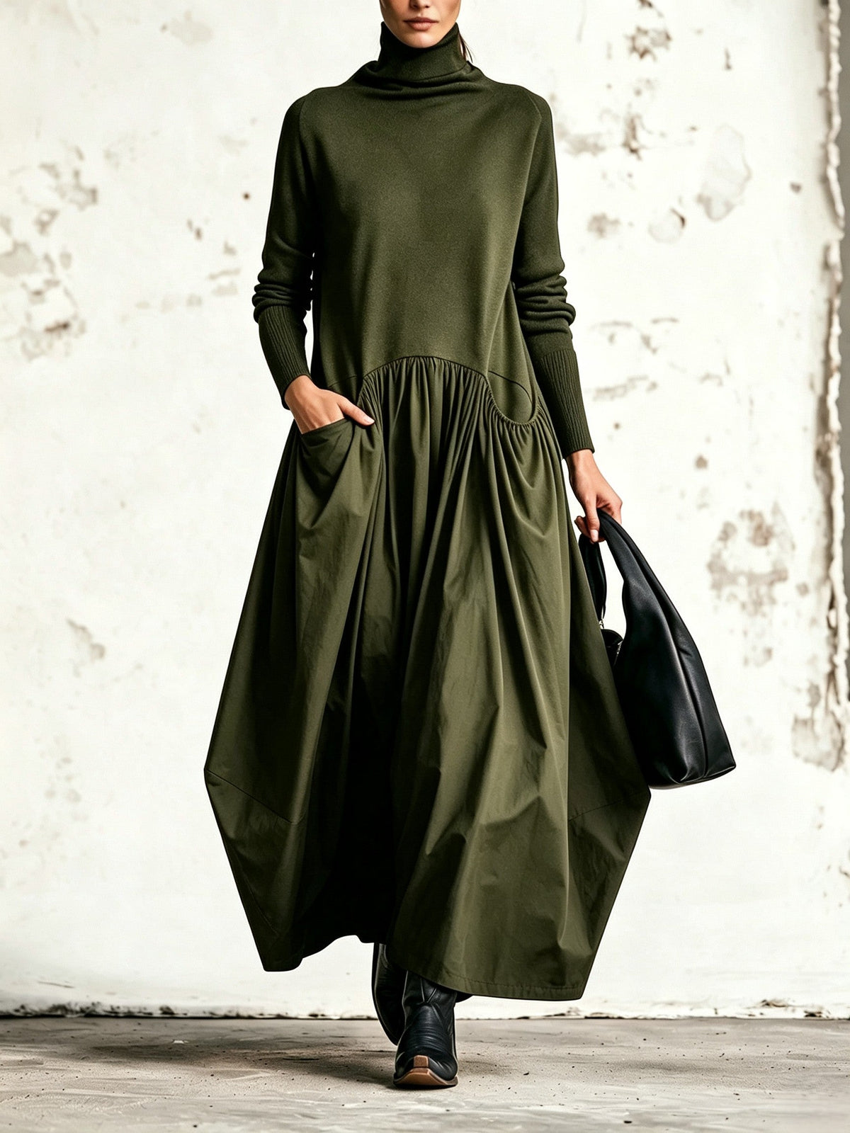 Celinne- Abito lungo oversize nero con collo alto e tasche decorative